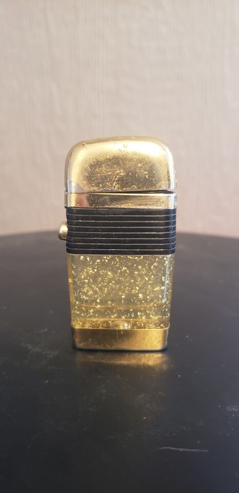 SCRIPTO VU LIGHTER VINTAGE GOLD TONE SPECS AND CLEAR LIGHTER MADE IN USA