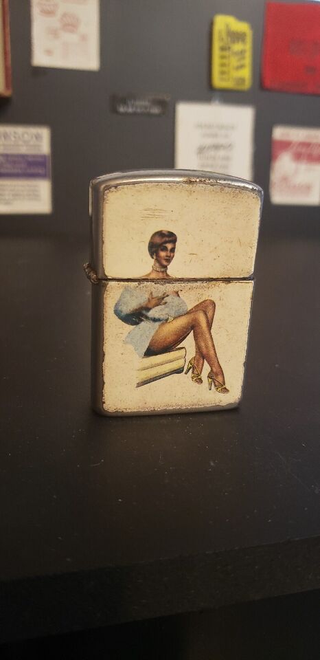 Flip Top Lighter by Penguin with pin up vintage, in working order
