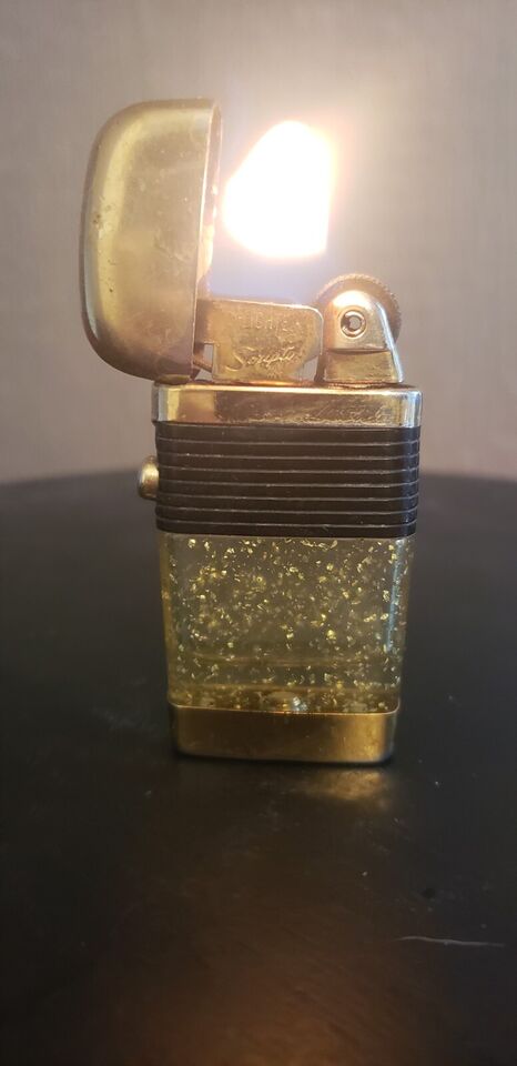 SCRIPTO VU LIGHTER VINTAGE GOLD TONE SPECS AND CLEAR LIGHTER MADE IN USA