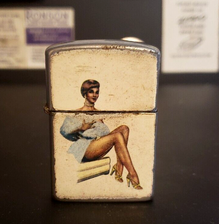 Flip Top Lighter by Penguin with pin up vintage, in working order