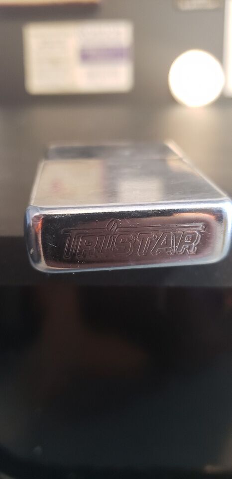 vintage tristar lighters engraved. in working order, flip top