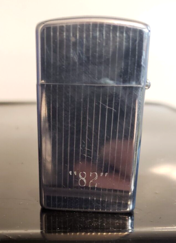Vintage Zippo Lighter - Polished Chrome with pinstripes, engraved "82" and "JHI", working