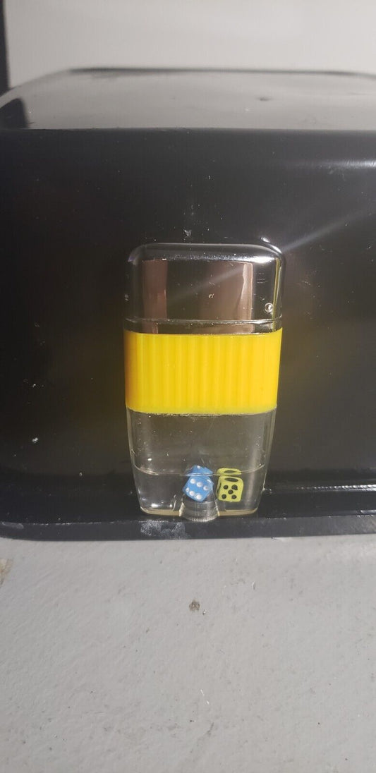 Vintage Scripto Vu style working dice lighter. Yellow Band, blue and yellow dice