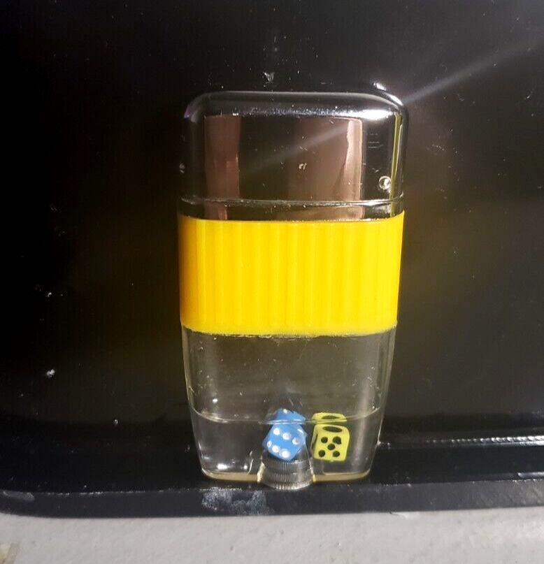 Vintage Scripto Vu style working dice lighter. Yellow Band, blue and yellow dice