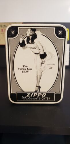 1998-1935 varga girl zippo With Box unstruck and sealed, vintage