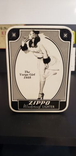 1998-1935 varga girl zippo With Box unstruck and sealed, vintage art lighter